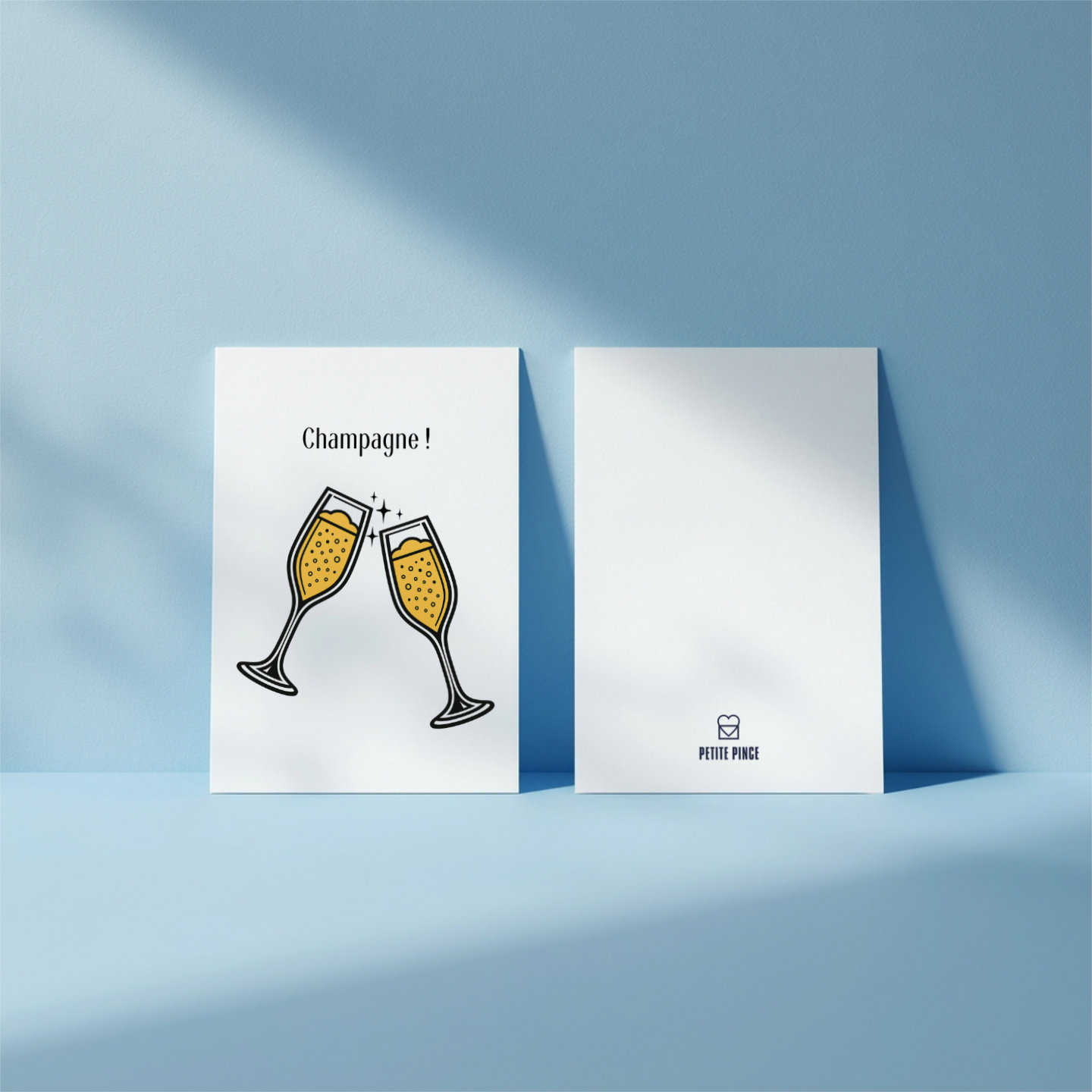 Vue recto verso d'une carte d'invitation ou félicitations Champagne marque Petite Pince.